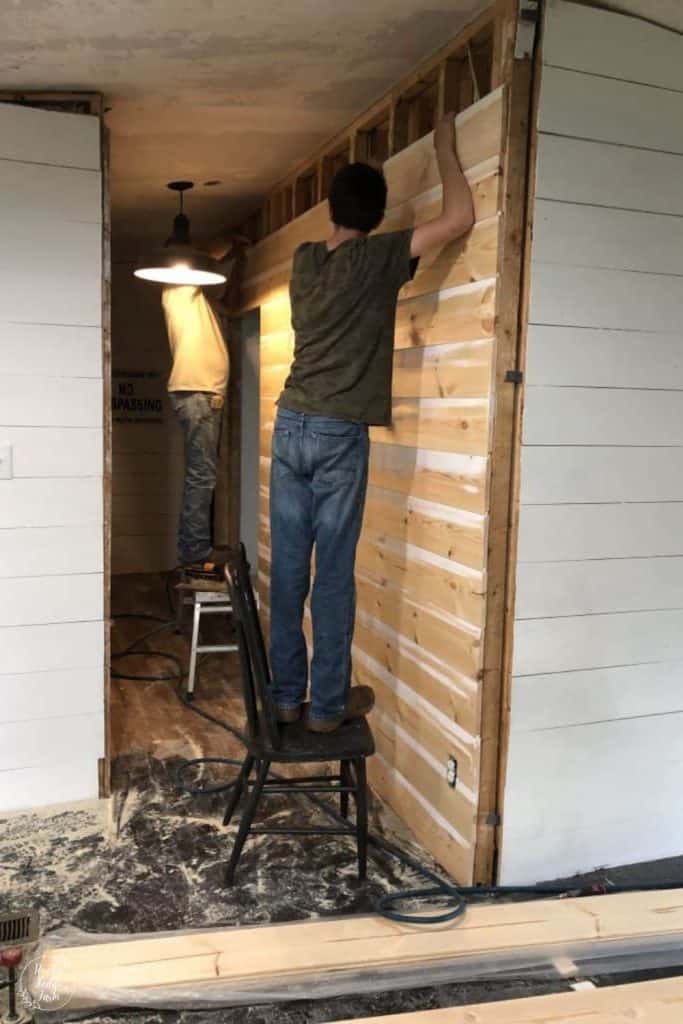 Putting shiplap on wall