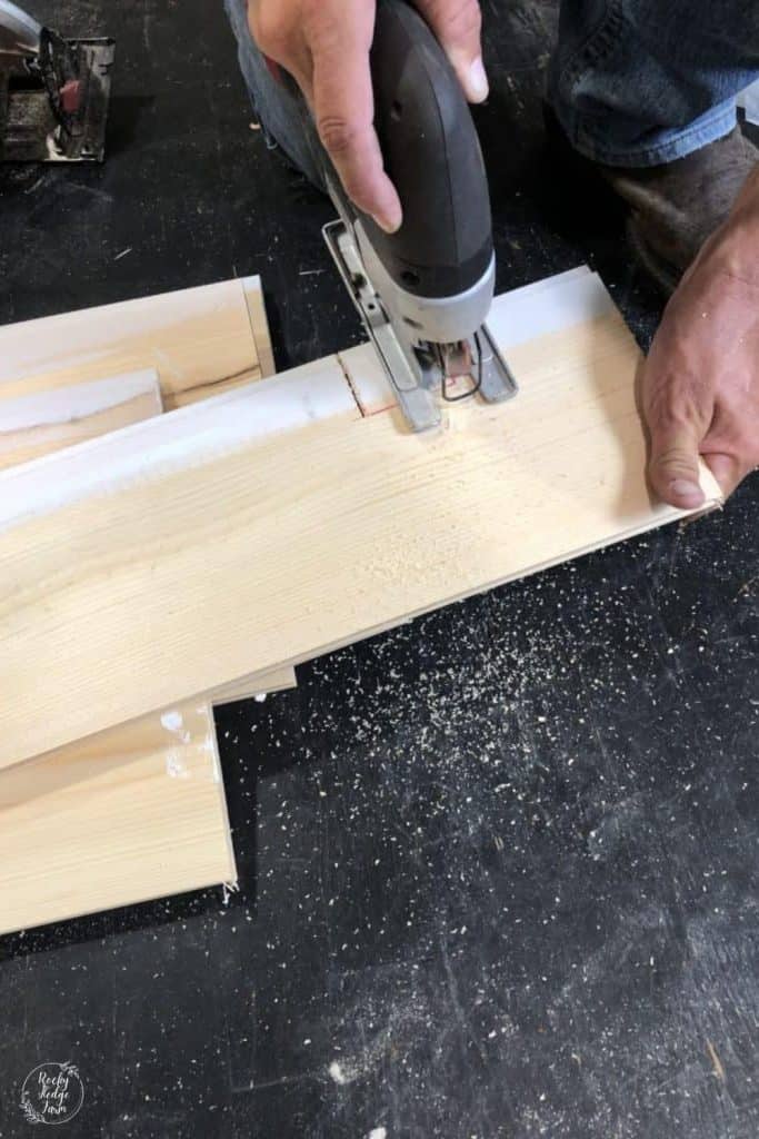 cutting a shiplap board to fit around an outlet