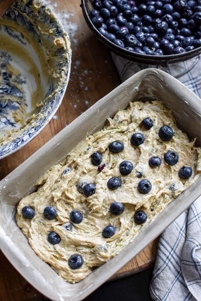 prepared blueberry zucchini batter in a 9x5 loaf pan