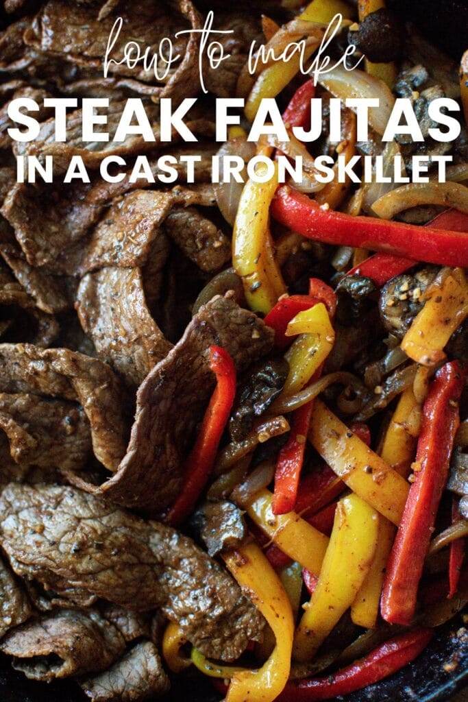 steak fajitas with bell peppers, onions and mushrooms in a cast iron skillet