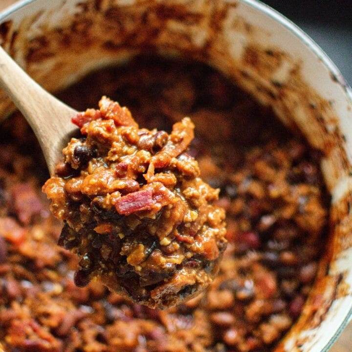 White Dutch Oven Filled with Slow-Simmered Cowboy Beans