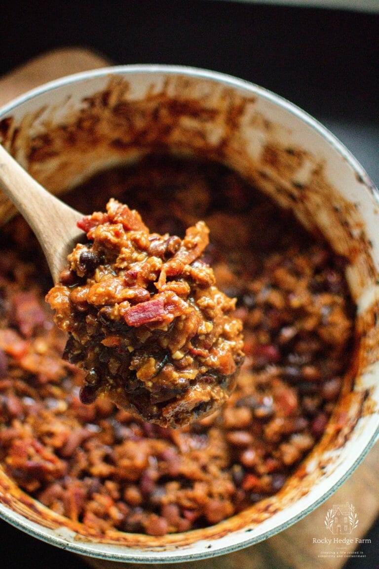 White Dutch Oven Filled with Slow-Simmered Cowboy Beans