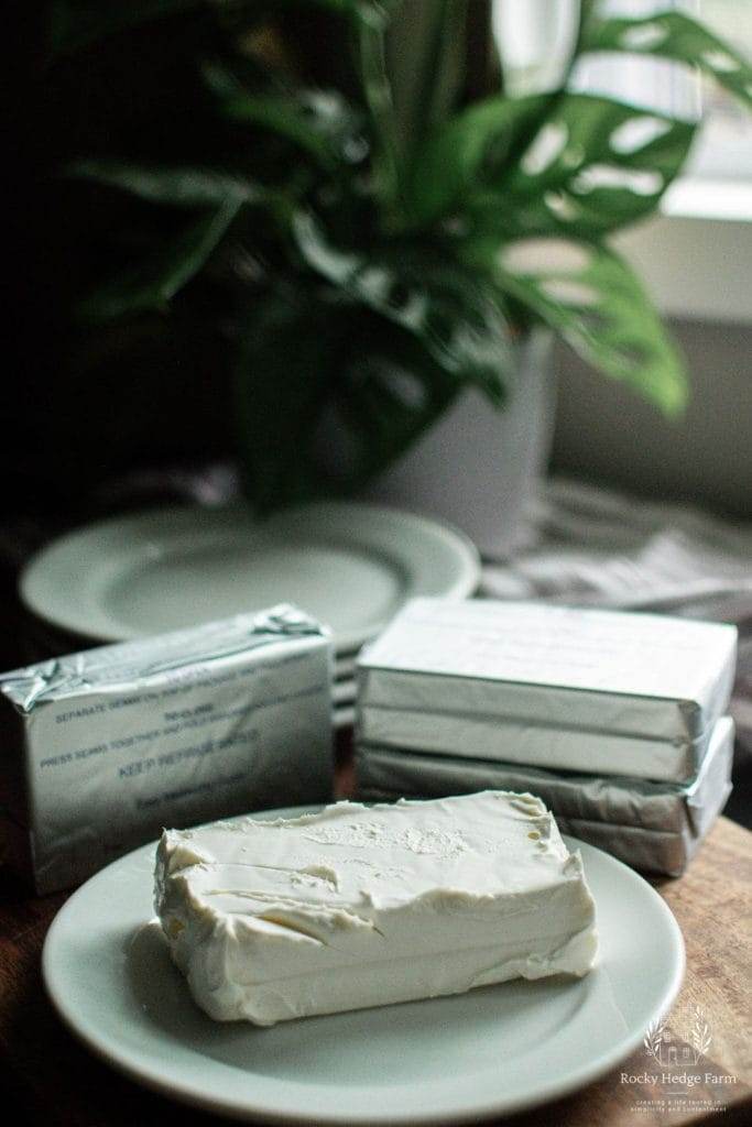 Cream cheese block on countertop