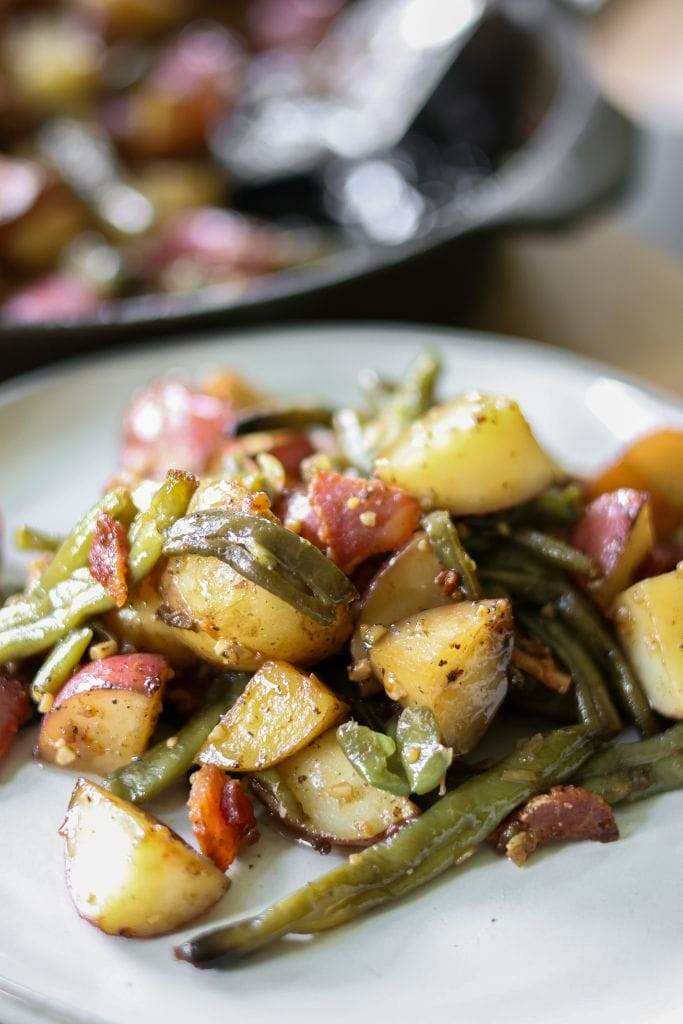 New potatoes and green beans cooked together in a single skillet.