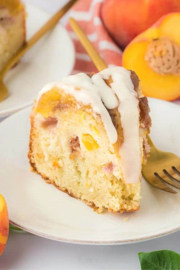 a slice of peach cobbler pound cake