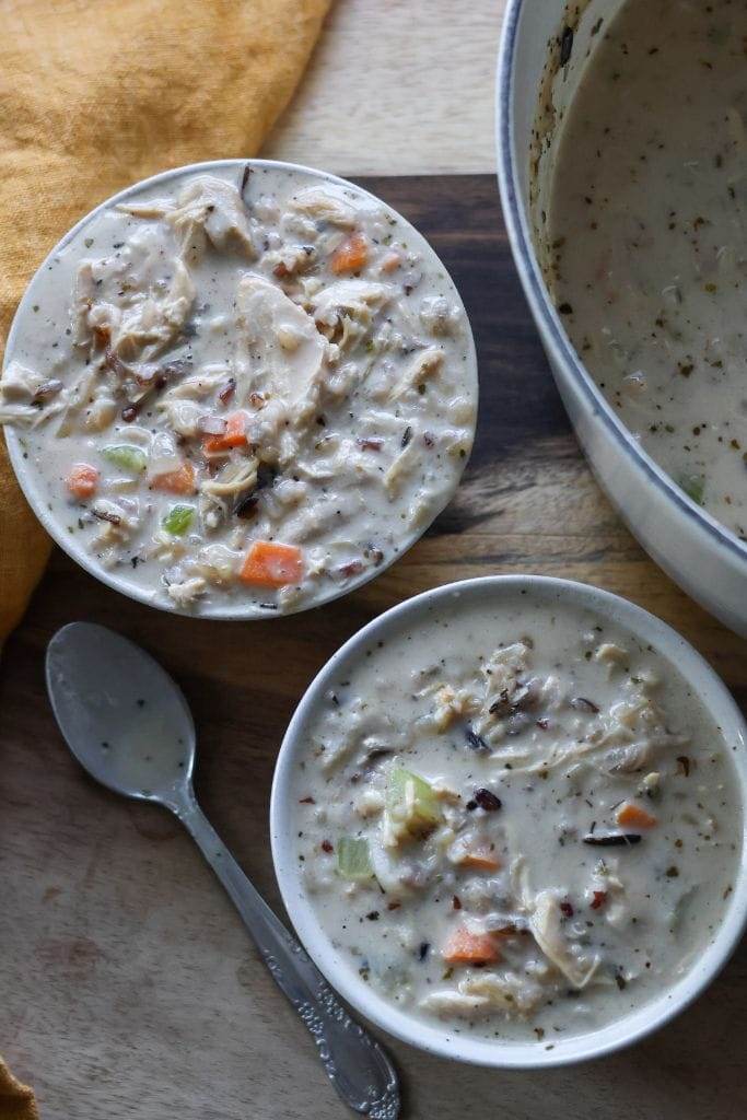 Two bowls of homemade chicken and wild rice soup