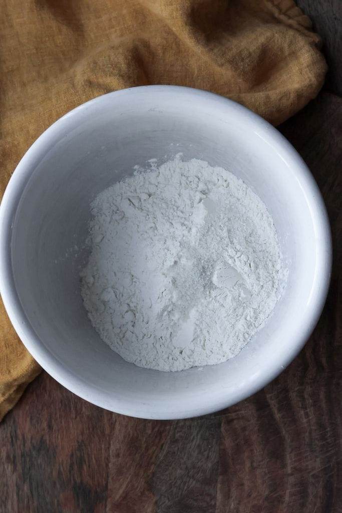 In a bowl, stir the flour and salt together.