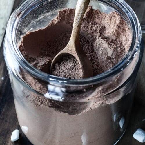 Homemade hot cocoa mix in a large jar.